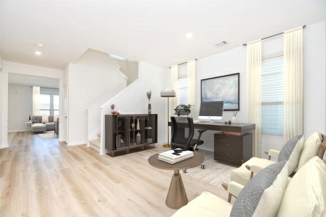 living room featuring recessed lighting, visible vents, stairway, wood finished floors, and baseboards