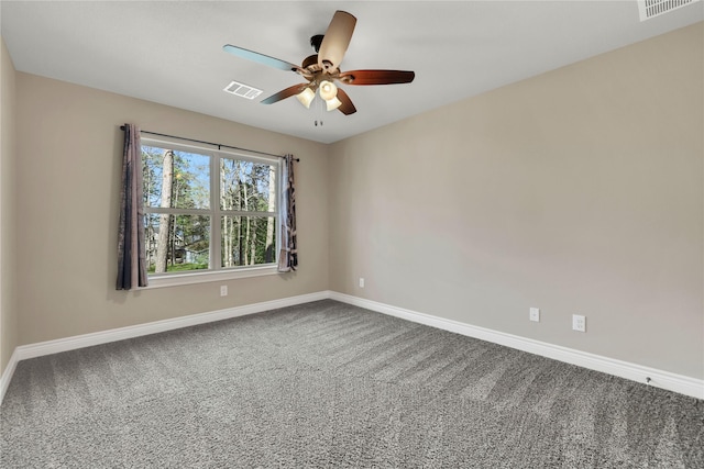 carpeted empty room with ceiling fan