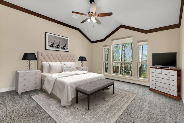 carpeted bedroom featuring ceiling fan, ornamental molding, and vaulted ceiling