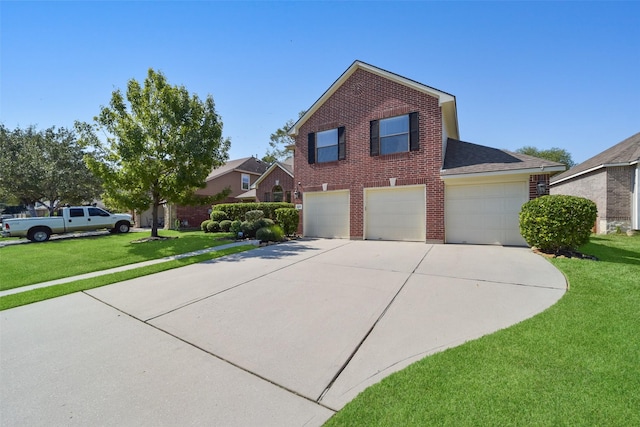 front facade featuring a garage and a front lawn