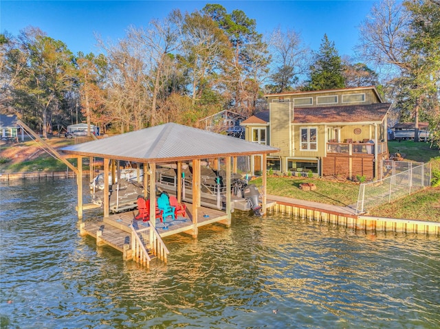 view of dock featuring a water view and boat lift