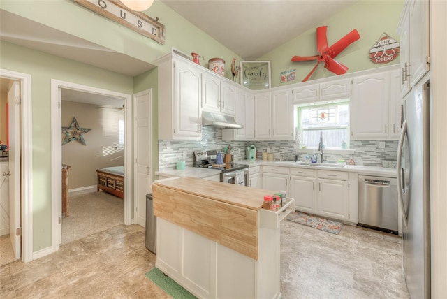 kitchen with sink, white cabinetry, and stainless steel appliances