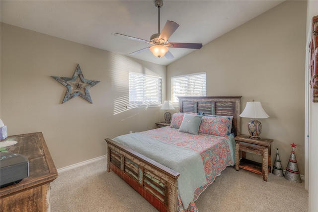 bedroom featuring ceiling fan, lofted ceiling, and light carpet