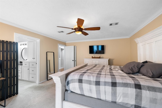 bedroom featuring ensuite bathroom, crown molding, a textured ceiling, light colored carpet, and ceiling fan