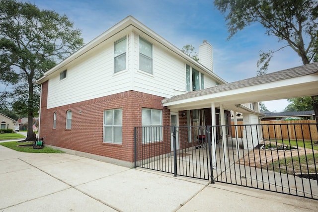 view of property exterior featuring a porch