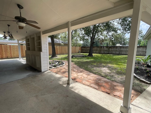 view of patio featuring ceiling fan