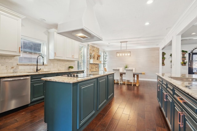 kitchen featuring dishwasher, sink, a kitchen island, island range hood, and white cabinets