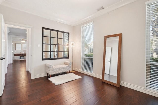 unfurnished room with dark hardwood / wood-style floors and ornamental molding