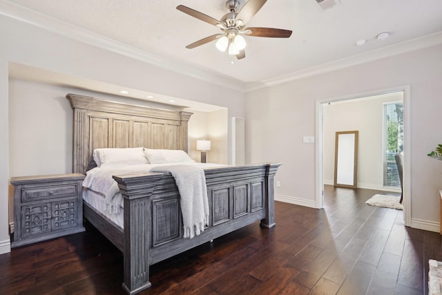 bedroom featuring dark wood-type flooring, ceiling fan, and ornamental molding