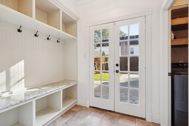 mudroom with washer / dryer and french doors