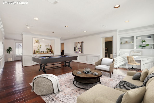 recreation room with wood-type flooring, built in features, crown molding, and pool table