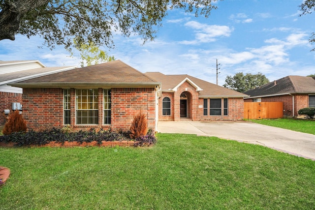 ranch-style house with a front lawn