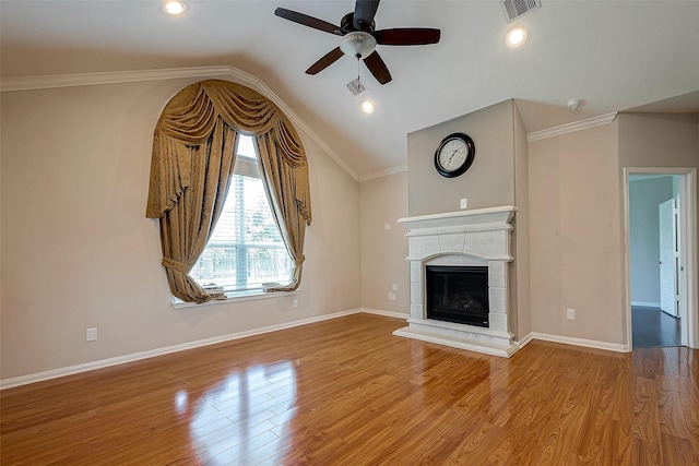 unfurnished living room featuring ceiling fan, light hardwood / wood-style floors, lofted ceiling, and a fireplace