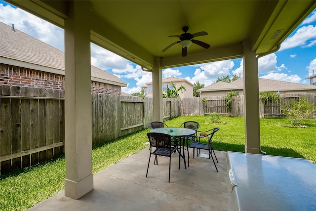 view of patio / terrace featuring ceiling fan