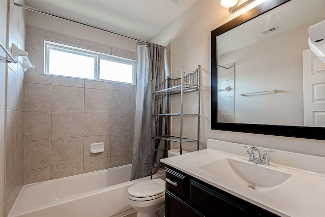 full bathroom featuring vanity, shower / bathtub combination with curtain, and toilet