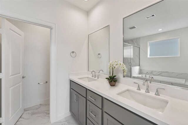 bathroom with shower with separate bathtub and vanity