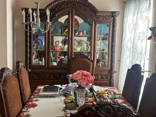 dining space with a notable chandelier and plenty of natural light