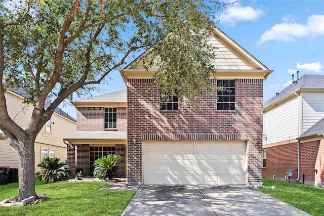 view of property featuring a front yard and a garage