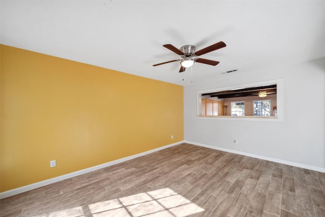 unfurnished room with light hardwood / wood-style flooring