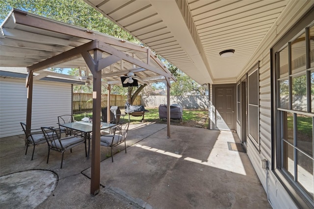 view of patio / terrace featuring ceiling fan