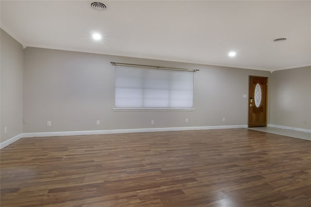 empty room featuring dark wood-type flooring