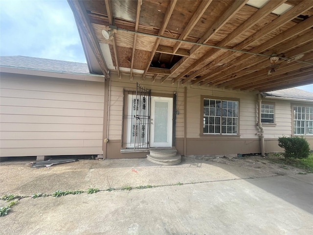 entrance to property with a patio