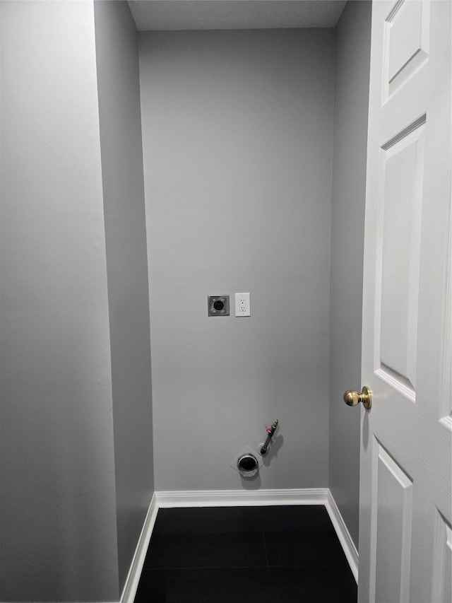 washroom with electric dryer hookup and hookup for a gas dryer