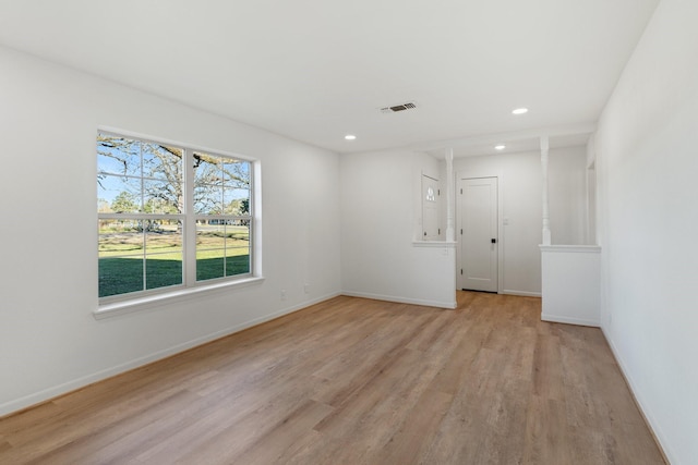 unfurnished room featuring light wood-type flooring