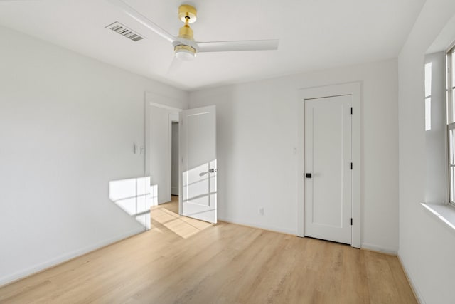 unfurnished bedroom with light hardwood / wood-style floors and ceiling fan