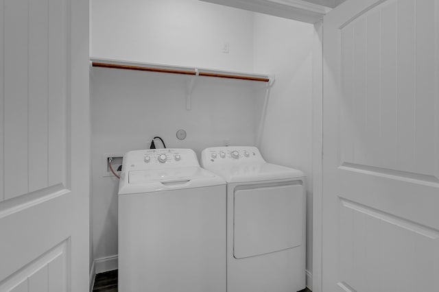 washroom featuring washing machine and clothes dryer