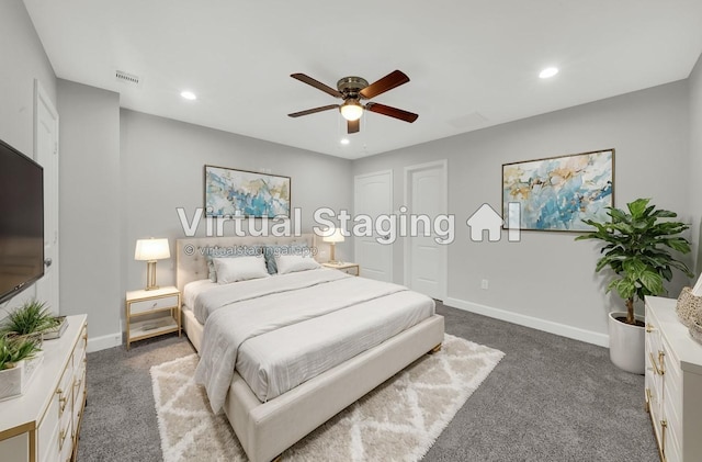 bedroom featuring ceiling fan and dark carpet