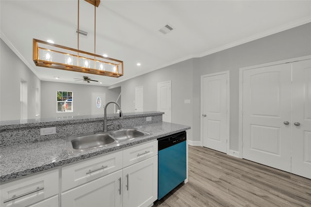 kitchen featuring white cabinetry, dishwasher, ceiling fan, sink, and decorative light fixtures