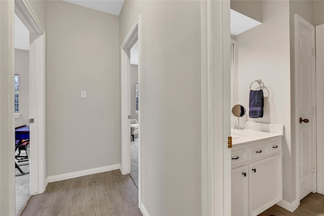 hallway featuring light wood-type flooring