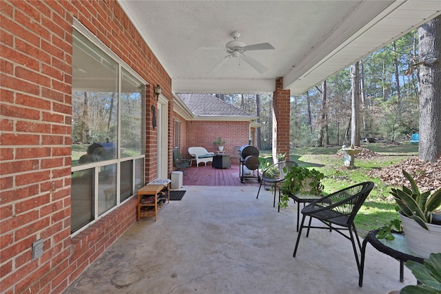 view of patio featuring ceiling fan