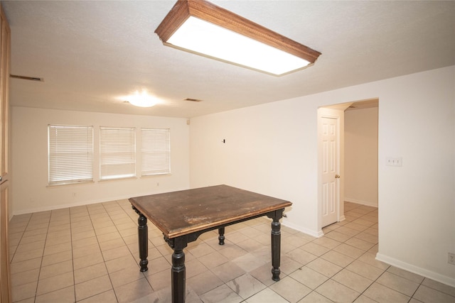 recreation room featuring light tile patterned floors