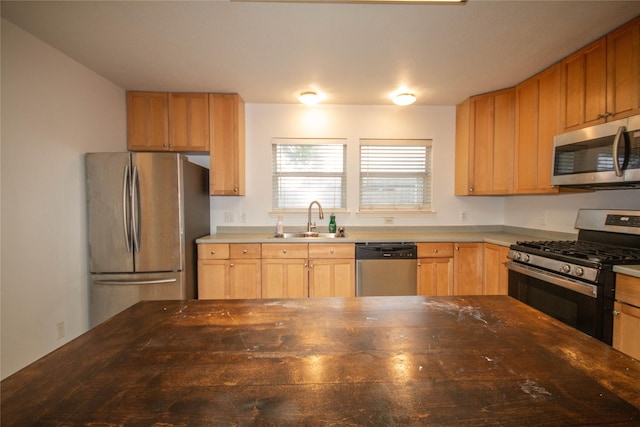 kitchen featuring sink and appliances with stainless steel finishes