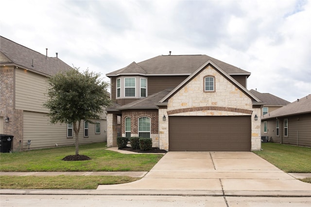 view of front of property featuring a front lawn, central AC unit, and a garage