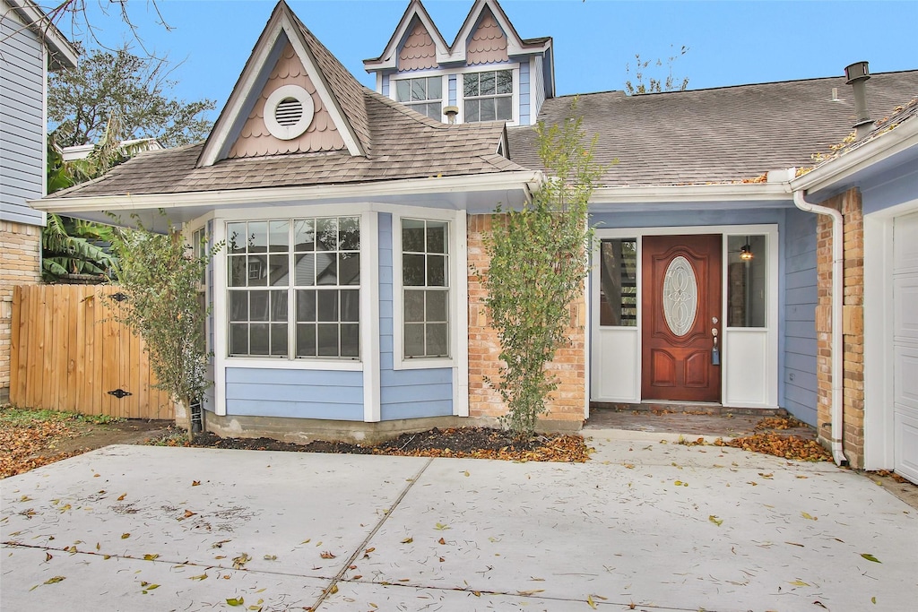 entrance to property with a patio