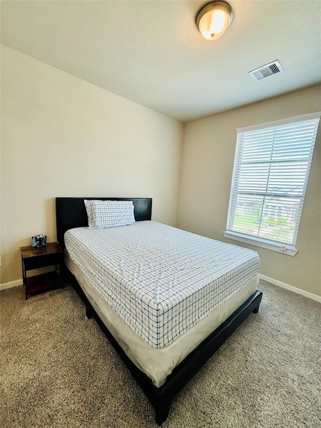 bedroom featuring carpet floors