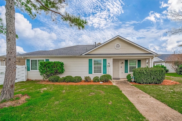 ranch-style house with a front yard