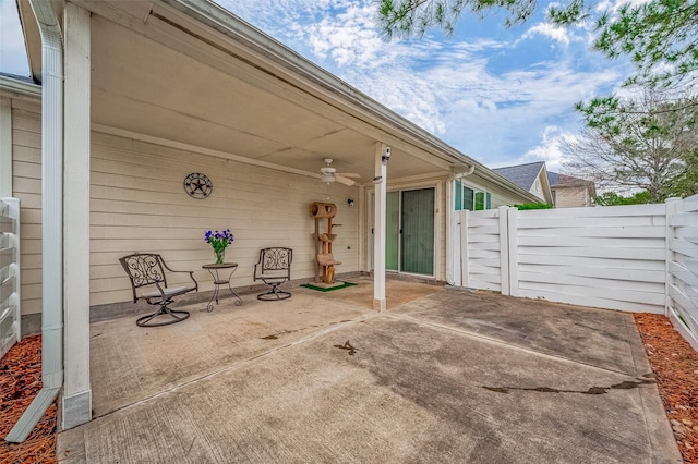 view of patio / terrace featuring ceiling fan