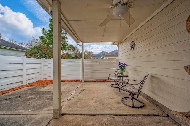 view of patio featuring ceiling fan