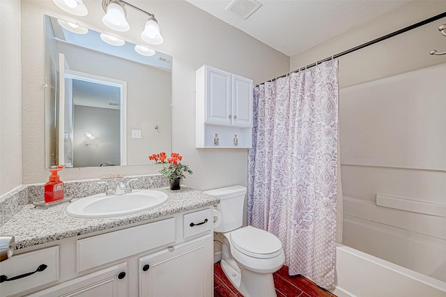 full bathroom with vanity, toilet, and shower / bath combo with shower curtain