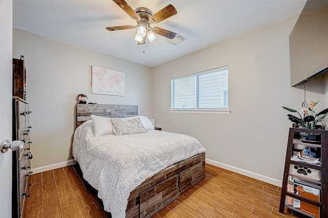 bedroom featuring ceiling fan and light wood-type flooring