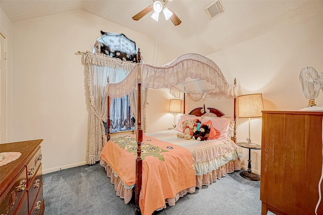 carpeted bedroom featuring a textured ceiling, ceiling fan, and vaulted ceiling