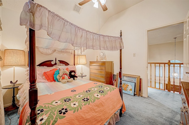 carpeted bedroom featuring ceiling fan and vaulted ceiling