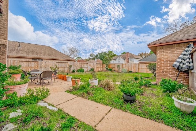 view of yard with a patio