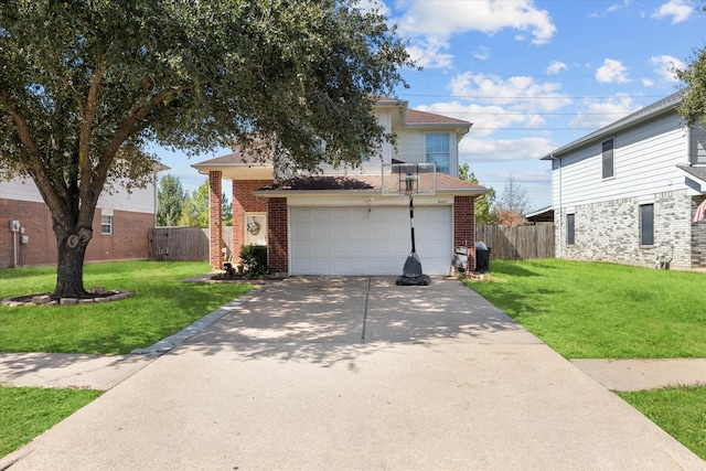 view of front of house featuring a garage and a front yard