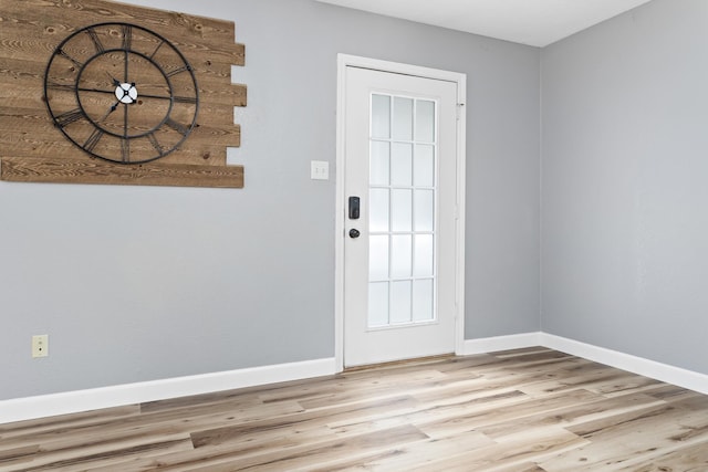 entryway with light hardwood / wood-style flooring