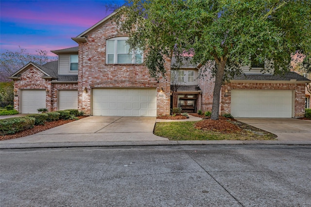 view of front of property featuring a garage